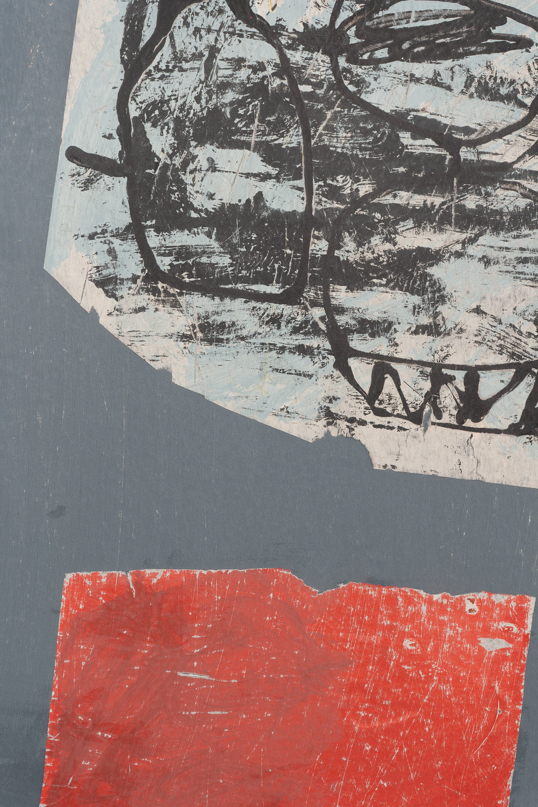 Abstract art piece with black and red elements on a grey background by artist Maisie Pack