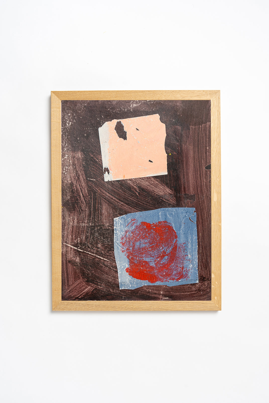 Abstract artwork with brown, blue, and red elements in a wooden frame on a white background by contemporary British artist Maisie Pack
