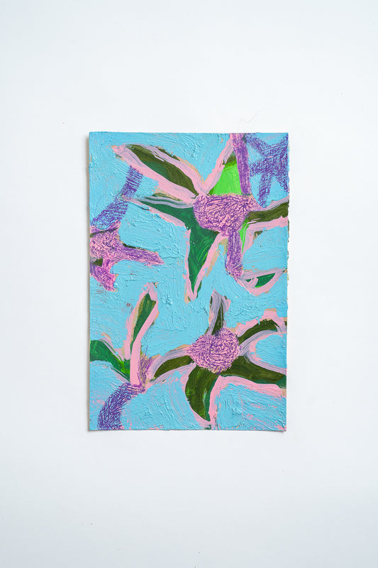 An abstract floral oil painting featuring textured purple flowers with green leaves on a light blue background, displayed against a clean white wall.