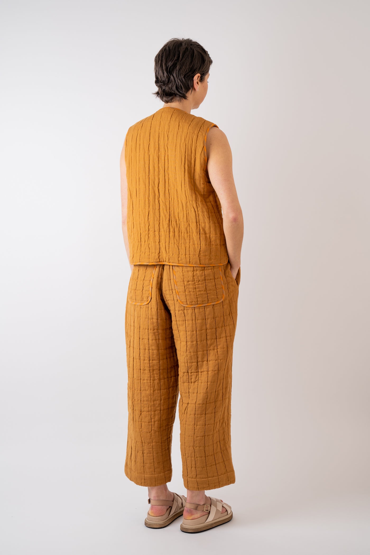 Cawley Studio Indian Jacquard Cotton and Irish Stripe Linen Ella Vest handmade in London styled with Cawley Studio Unisex Trouser in Burnt Orange