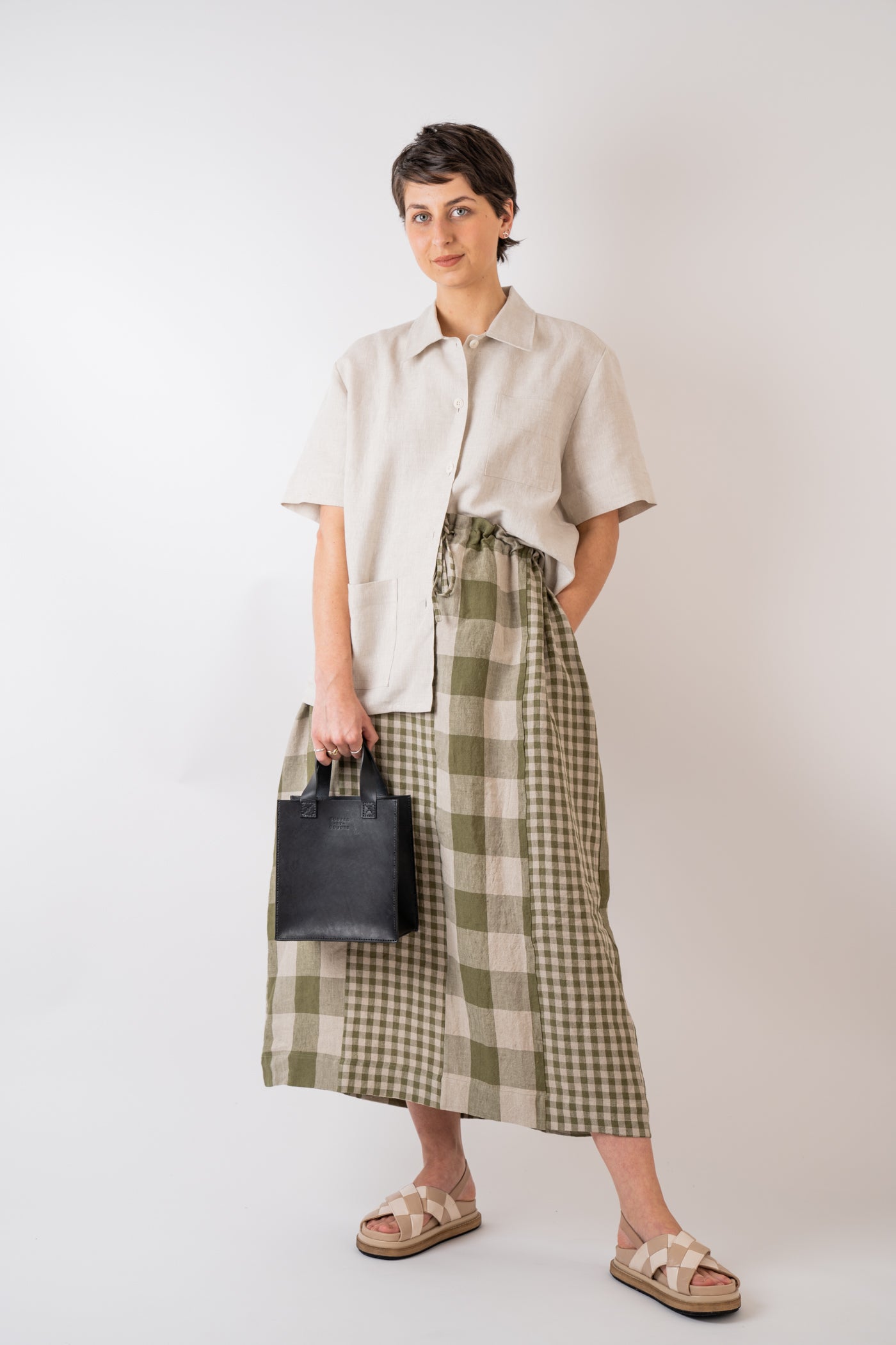 Xi Atelier Linen Cleo Shirt in Natural styled with Couper et Coudre Jour Bag in Noir and Cawley Studio Linen Gingham Joyce Skirt