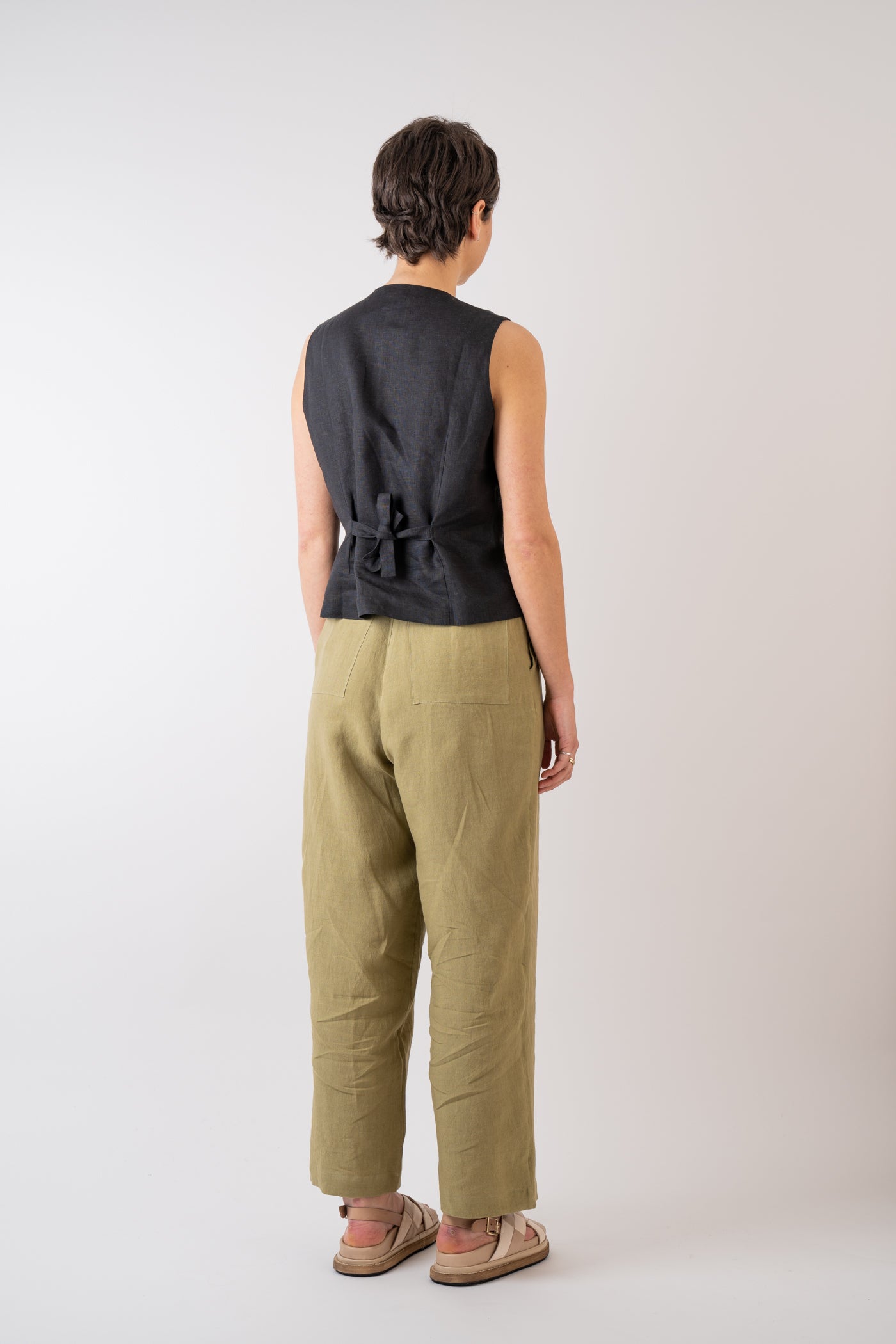 Xi Atelier Linen Avery Waistcoat in black with adjustable tie at the back