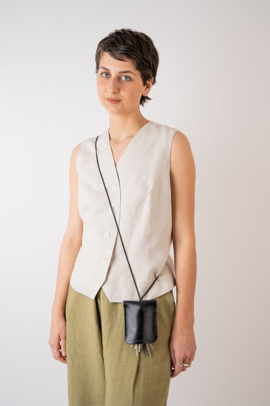 Xi Atelier Linen Avery Waistcoat in natural styled with MIMMO Studios leather key-fob in Black and Cawley Studio Linen Georgia Trouser
