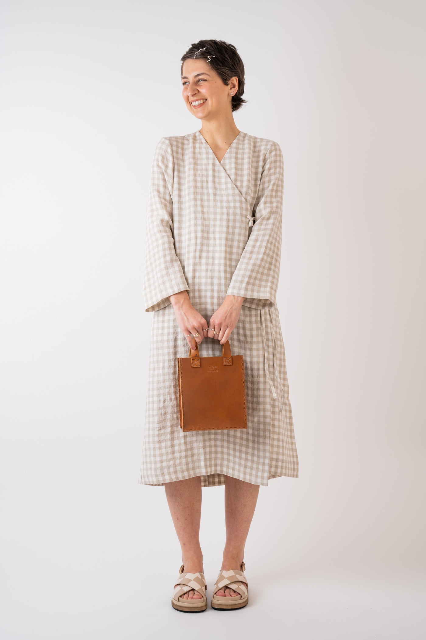 Cawley Studio 100% Irish Stripe  Linen Marina Dress in Gingham handmade in London MIMMO Exclusive styled with Couper et Coudre Leather Jour Bag in Cognac handmade in Somerset